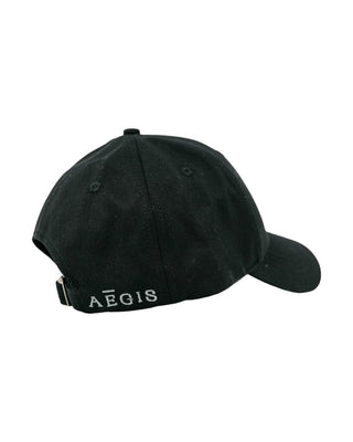 A black baseball cap from an EMF (electromagnetic field) apparel line with the word 'AEGIS' embroidered in white on the adjustable strap at the back.