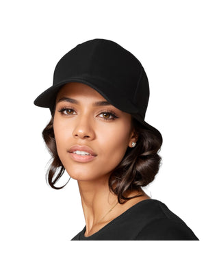 A woman with medium-toned skin wearing a stylish black EMF protective cap paired with a chic black top, showcasing modern electromagnetic field shielding apparel for health-conscious consumers.